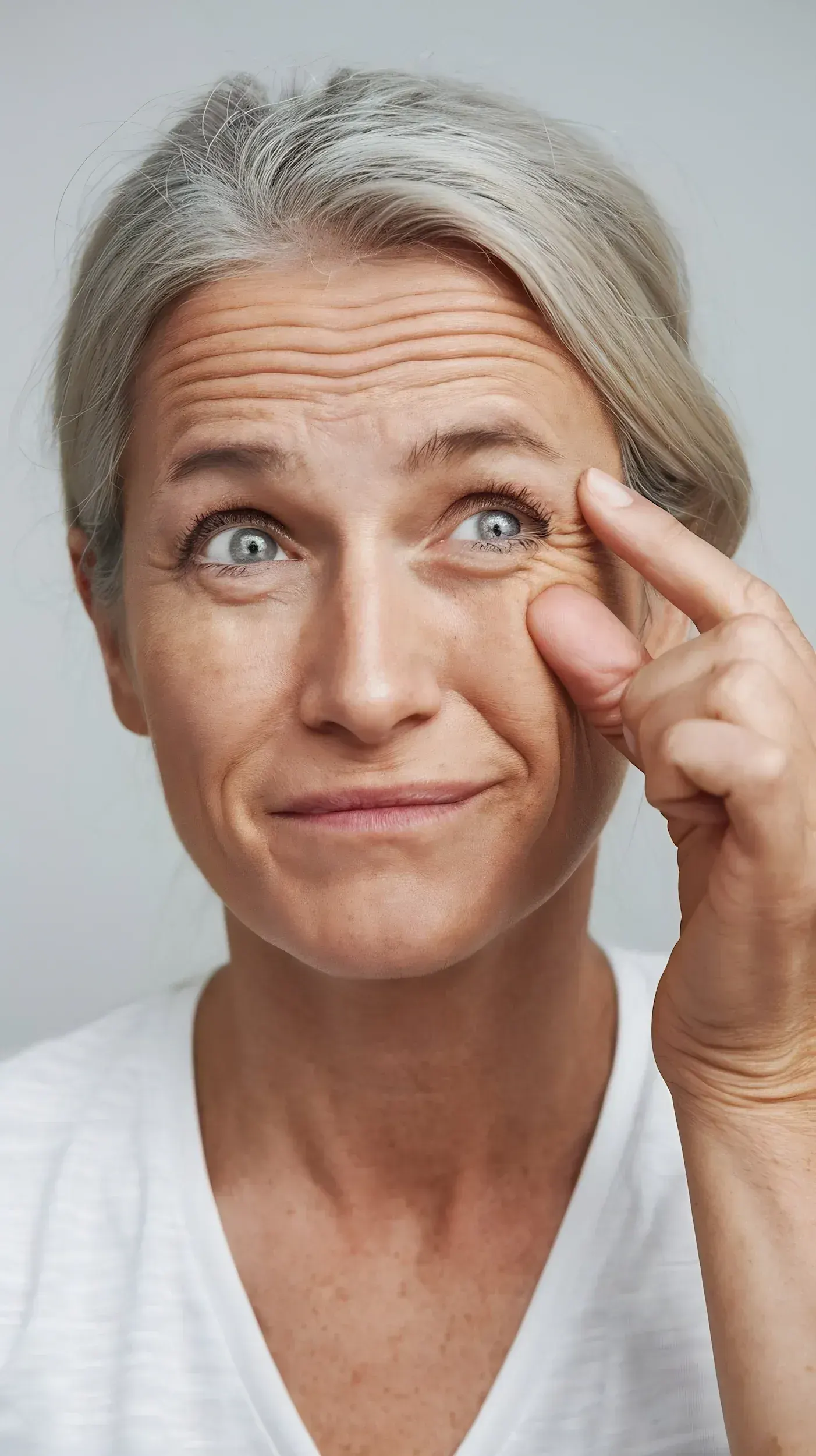 Person noticing fine lines around their eyes at Radiant Laser MD Cambridge